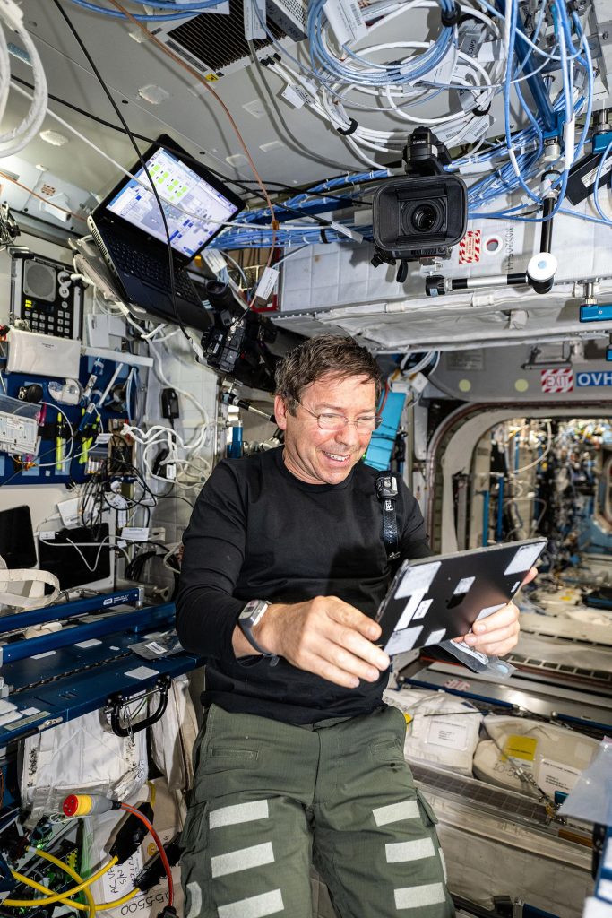 NASA Astronaut Michael Barratt Uses iPad on ISS