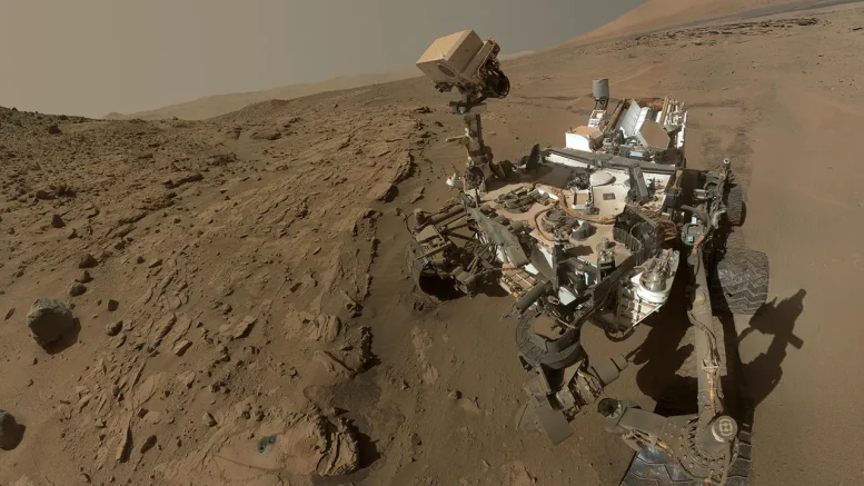 NASA's Curiosity Mars Rover Sports A Fine Coating Of Rust Colored Dust