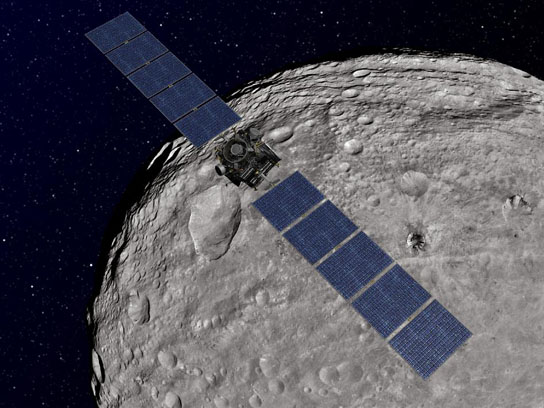 NASA's Dawn spacecraft orbiting the giant asteroid Vesta