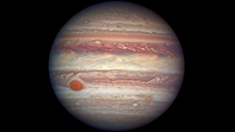 moon of jupiter named after a muse crossword clue