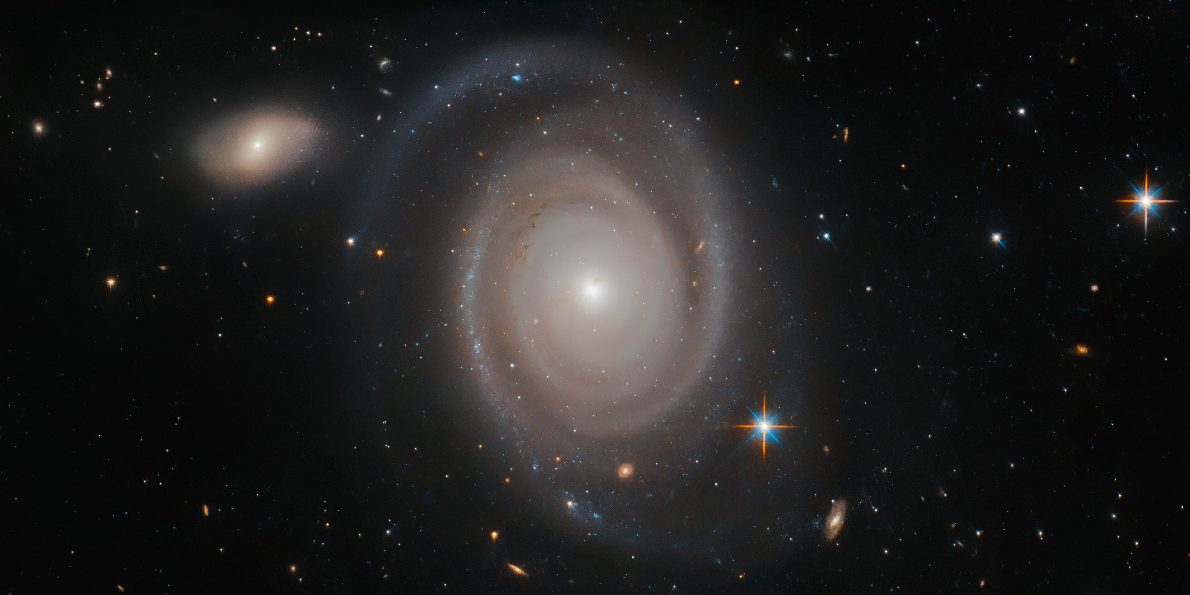 Hubble Space Telescope Spots a Galaxy – And It’s Not Alone