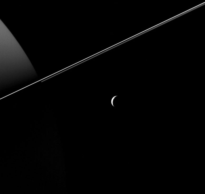 New Cassini Image Crescent Tethys and Rings