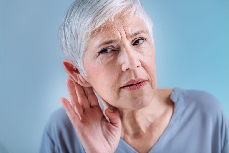 Old Woman Hearing Loss Concept