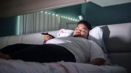 Overweight Man TV Bed Sleeping