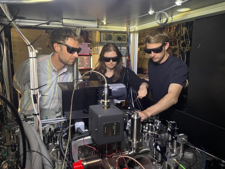 Oxford Clarendon Laboratory Researchers With Experimental Equipment