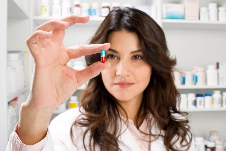 Pharmacist Holding Medicine Pill Tylenol