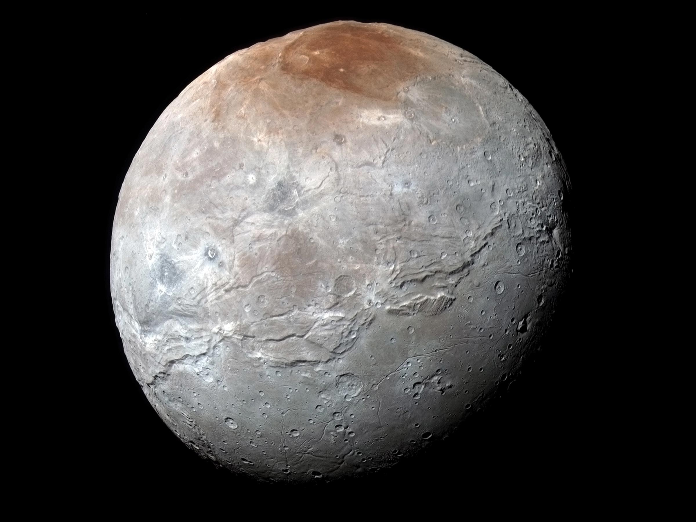 Scientists Identify a Possible Source for Red Cap on Pluto's Largest Moon Charon - SciTechDaily