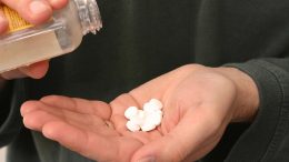 Pouring Aspirin Tablets