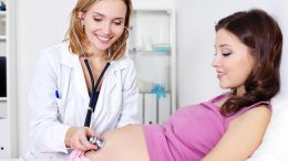 Pregnant Woman with Doctor