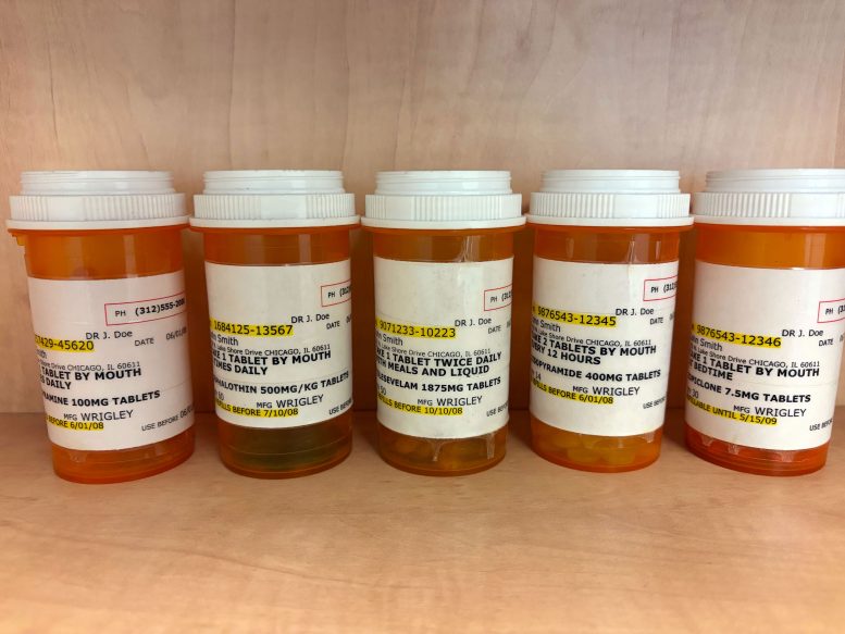 Prescription Medication Bottles on Shelf