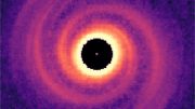 Protoplanetary Disk With Spiral Arms