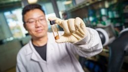 Researcher Holding Healable Sulfur Cathode