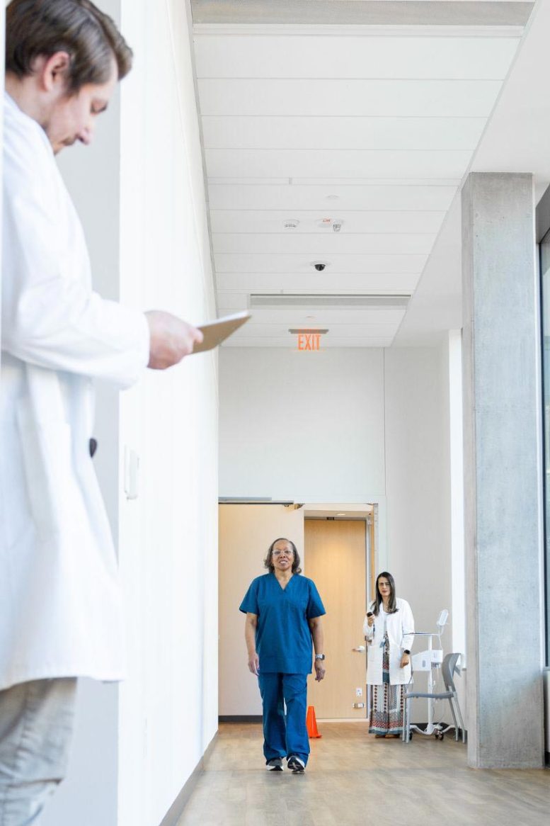 Researcher Studies How Participant Walks