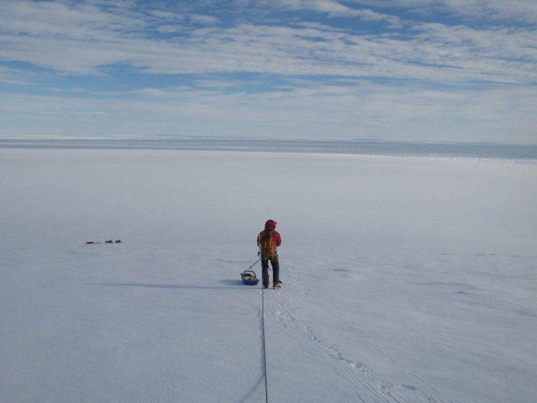 Researcher Traversing Antarctic Ice Sheet