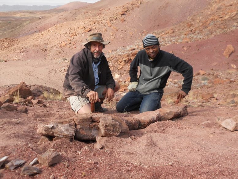 Roger Smith and Sibusisu Mtungata With Fossil