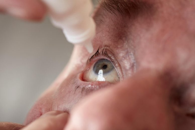 Senior Man Eye Drops Close Up