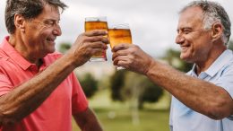 Senior Men Beer Celebrating