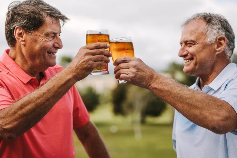 Senior Men Beer Celebrating