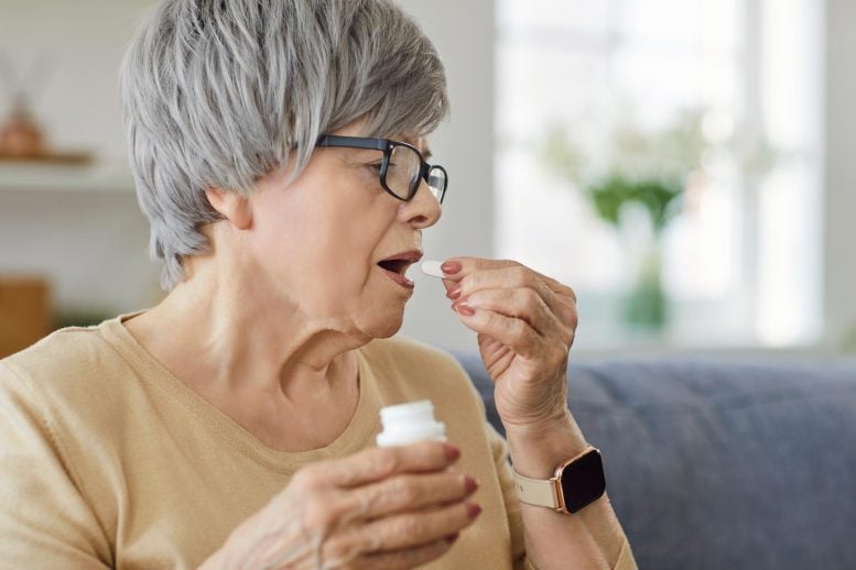 Senior Woman Vitamin Supplement Medication Pill