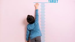 Short Child Measuring Height