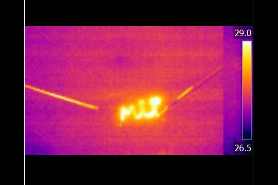 Infrared (heat) image shows a heating device made from steam-cracked tar, annealed with a laser, which was formed into an MIT logo to demonstrate the 
