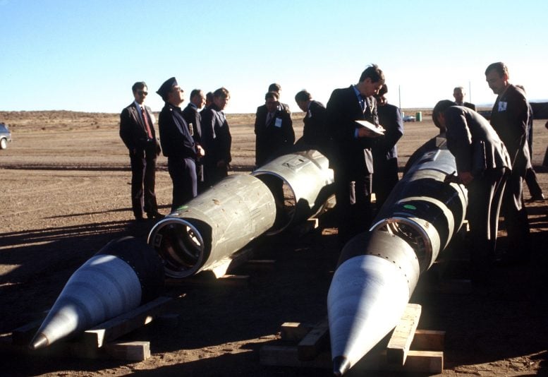 Soviet Weapons Inspectors Examine Disassembled Pershing II Missiles