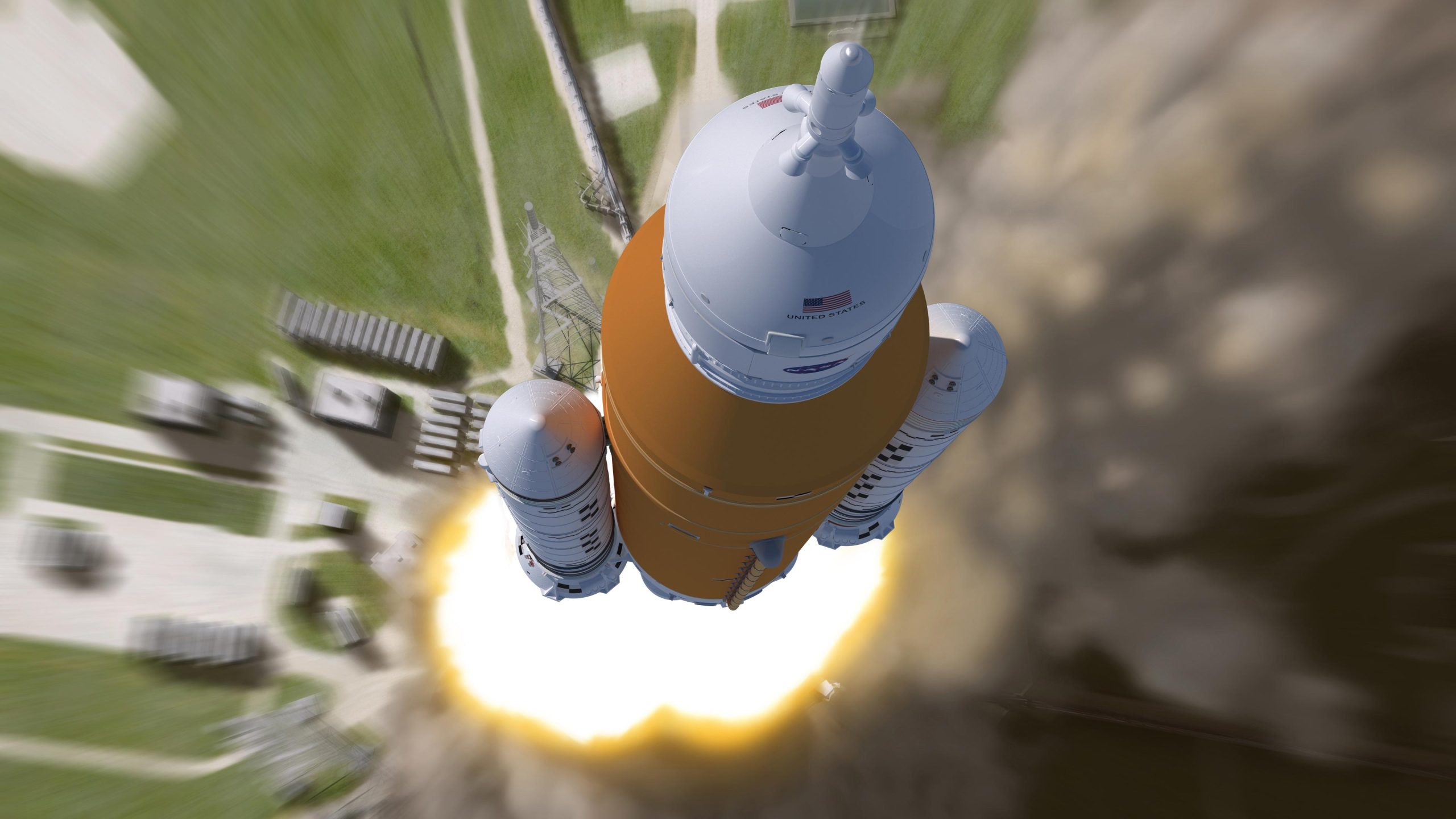 This artist’s rendering shows an aerial view of the liftoff of NASA’s Space Launch System (SLS) rocket. This Block 1 crew configuration of the rocket will send the first three Artemis missions to the Moon. Credit: NASA/MSFC