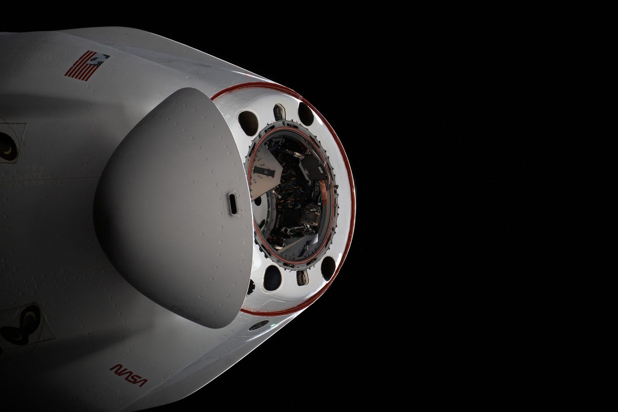 SpaceX Cargo Dragon supply ship with open nose cone