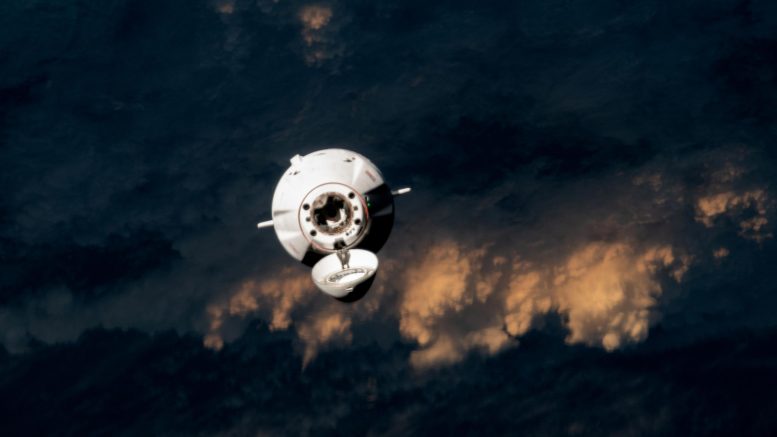SpaceX Dragon Cargo Craft Approaches Space Station for Docking
