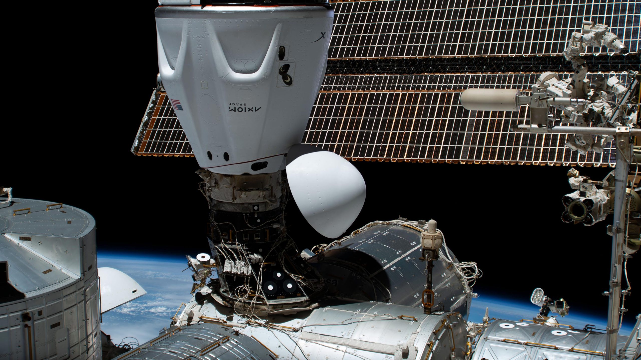 SpaceX Dragon’s Successful Cargo Delivery to Space Station Sets Up Friday’s Spacewalk