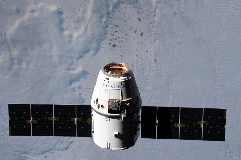 SpaceX Dragon Over Earth During ISS Expedition 61