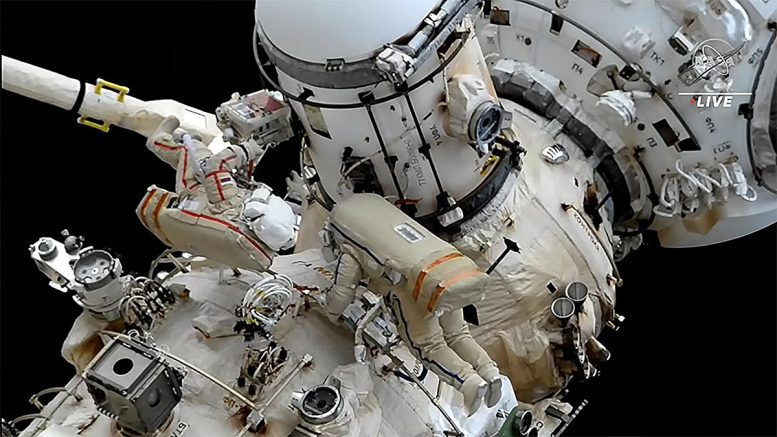 Spacewalkers Sergey Prokopyev and Dmitri Petelin Work Outside the Space Station