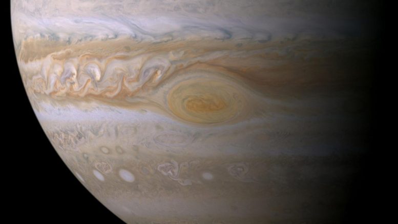 Sunlight Produces the Color of Jupiter's Great Red Spot