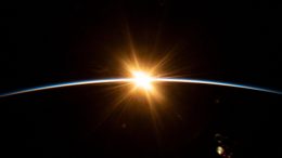 Sun's First Rays Burst Over Earth's Horizon