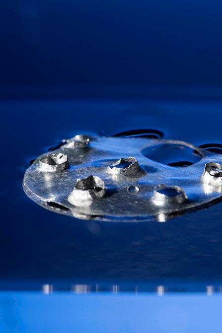 Superhydrophobic Metal Floats with Holes