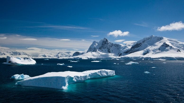 Tabular Iceberg Floating Within Paradise Harbour, Antarctica