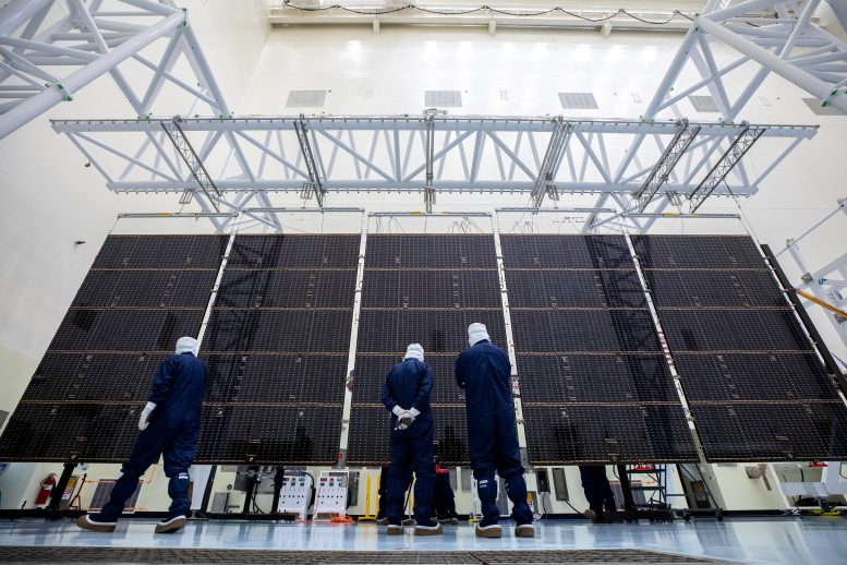 Technicians Examine Solar Arrays Built for NASA’s Europa Clipper