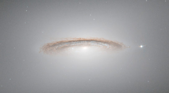The Whirling Disc of NGC 4526