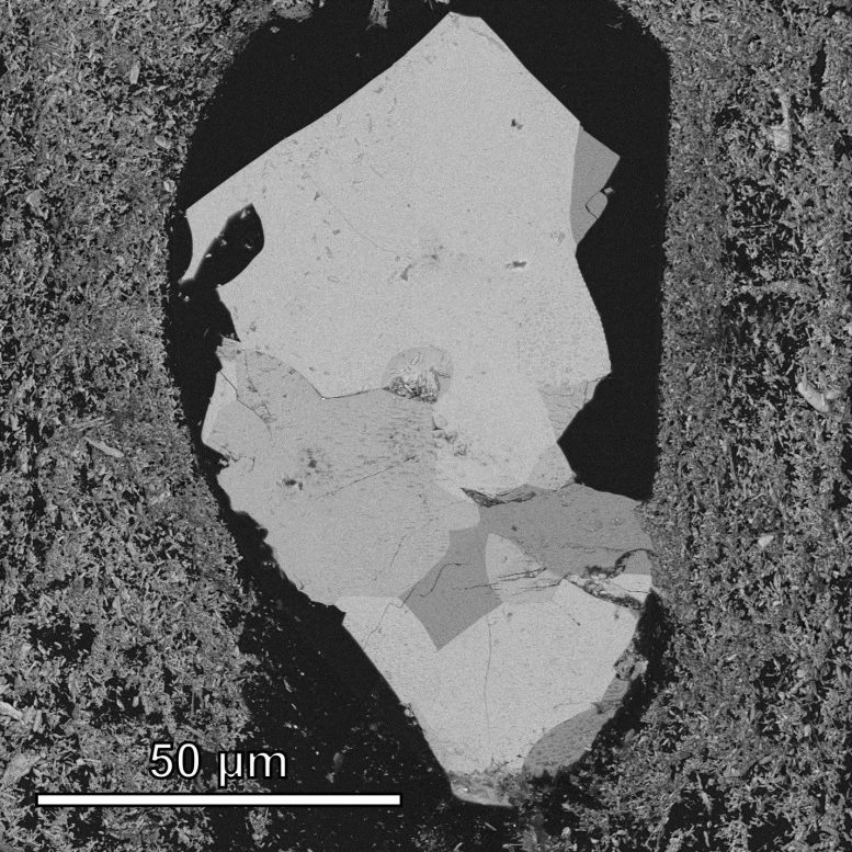 Thin Section of Asteroid Sample Seen in an Electron Microscope