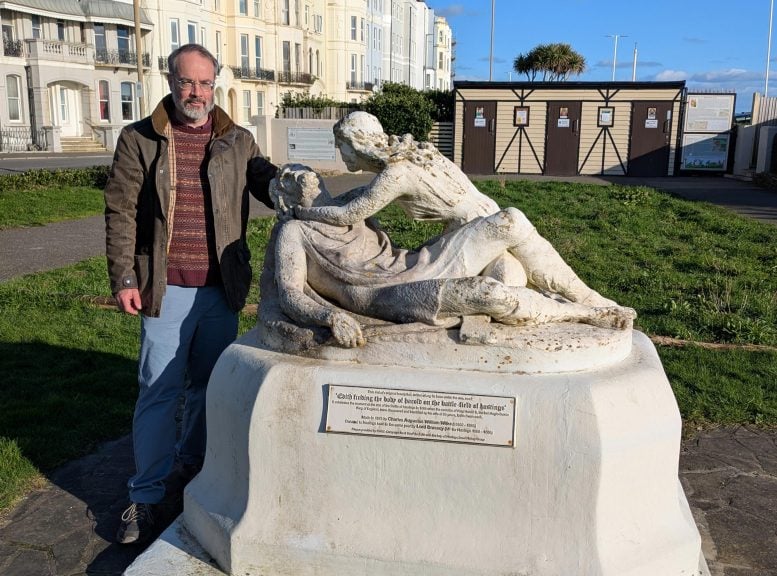 Tom Licence With the Statue of Harold and Edith West Marina Gardens
