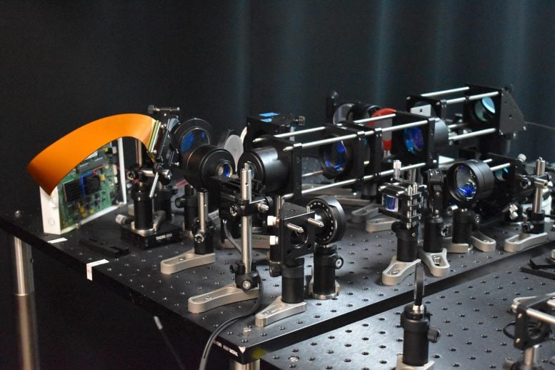 Two-Photon Microscope With Adaptive Line-Excitation Scheme Optical Setup