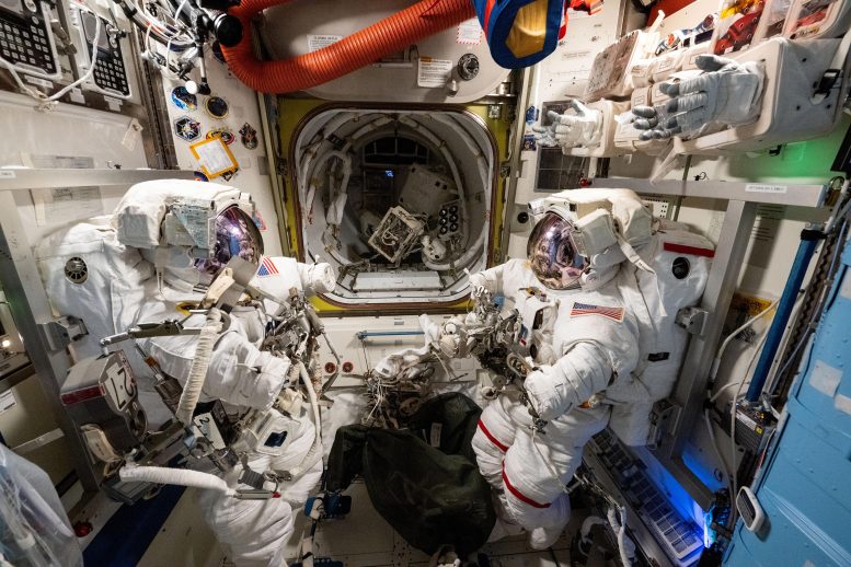 Two Spacesuits Staged Inside Quest Airlock