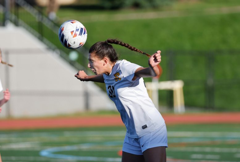 University of Rochester Soccer Player Heads Ball