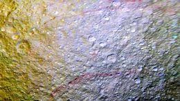 Unusual Red Arcs Spotted on Icy Saturn Moon
