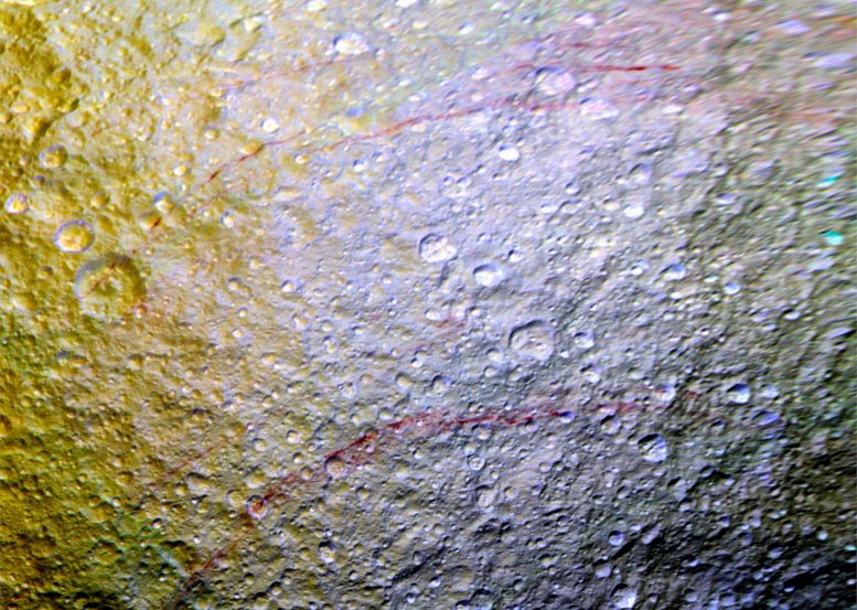 Unusual Red Arcs Spotted on Icy Saturn Moon