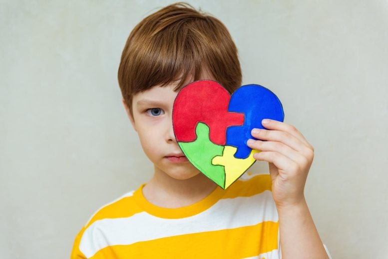 Upset Boy Holding Puzzle Heart Child Mental Health Autism