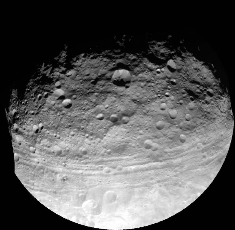 Vesta's Troughs Suggest Stunted Planet