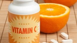 Vitamin C Tablets and Oranges