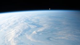 Waning Gibbous Moon Above Earth's Horizon