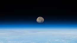 Waning Gibbous Moon Sets Just Beyond Earth’s Horizon